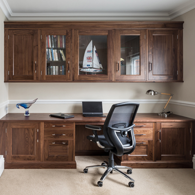 Wood is always a sound choice for office furniture - such as this warm, rich walnut design by Rencraft