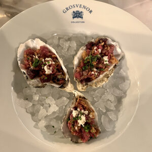 Dexter beef tartare came with seasoned Colcheter oysters and was served in their shells