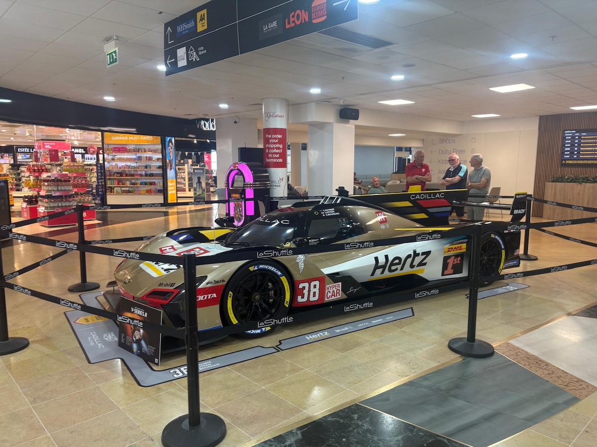 Visitors to the LeShuttle terminal Hertz Team JOTA Cadillac V-Series.R show car