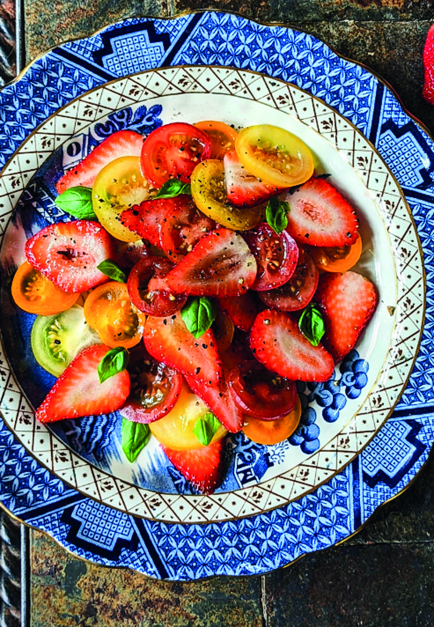 Strawberry salad with tomatoes and black garlic balsamic dressing